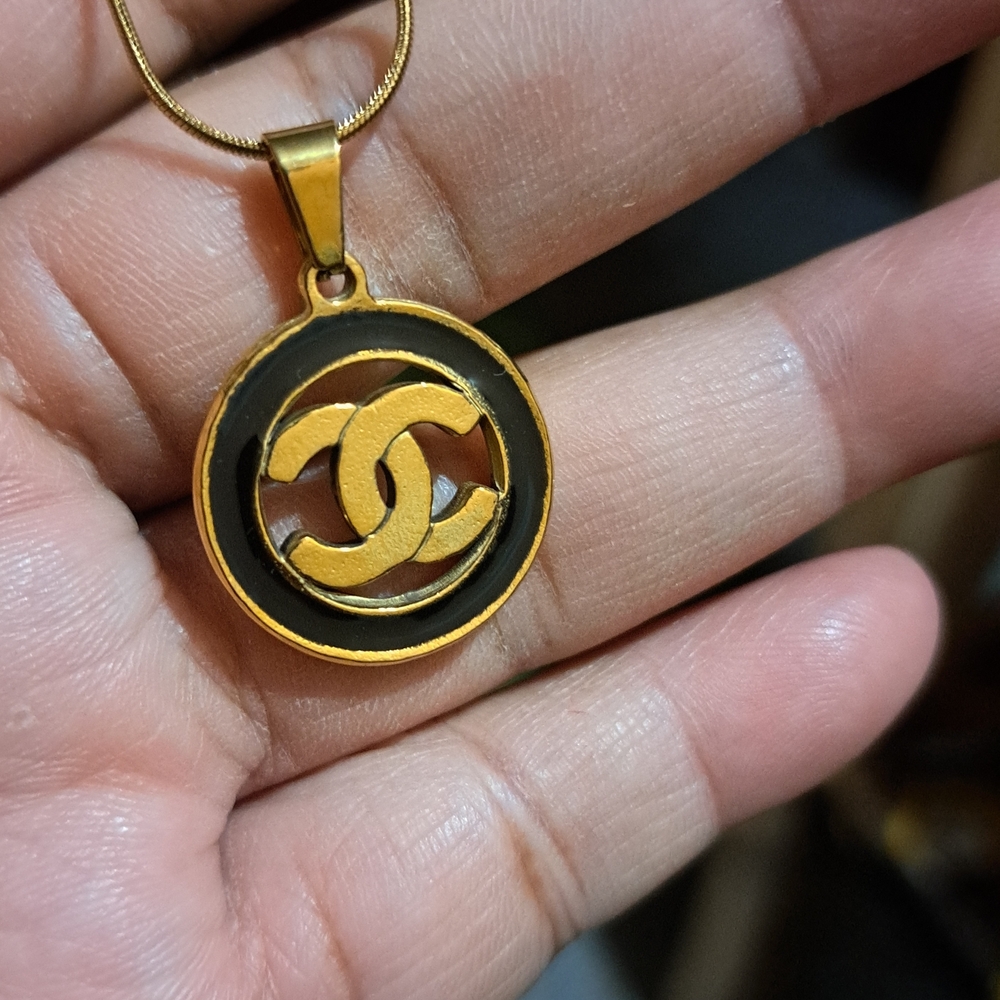 Golden Interlocking Circle Pendant Necklace - Black Accent